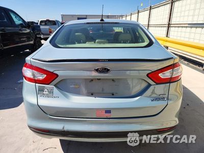 Zdjęcie 6 z 13 samochodu: 2013 FORD FUSION SE HYBRID VIN:3FA6P0LUXDR286052 - miniatura