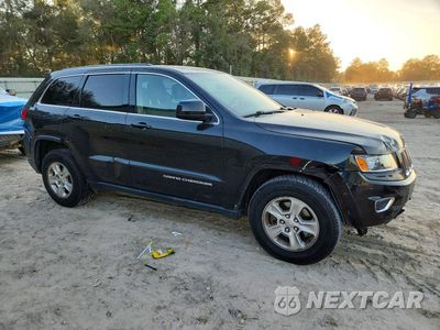 Czwarte zdjęcie samochodu z boku: 2014 JEEP GRAND CHEROKEE LAREDO VIN:1C4RJEAG2EC225233 - miniatura