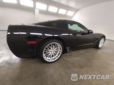 Trzecie zdjęcie samochodu z tyłu: 2004 CHEVROLET CORVETTE VIN:1G1YY22GX45133576 - miniatura