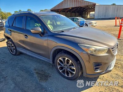 Czwarte zdjęcie samochodu z boku: 2016 MAZDA CX-5 GT VIN:JM3KE2DY3G0668916 - miniatura