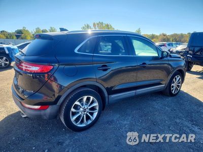 Trzecie zdjęcie samochodu z tyłu: 2018 LINCOLN MKC SELECT VIN:5LMCJ2D96JUL08873 - miniatura