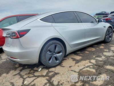 Trzecie zdjęcie samochodu z tyłu: 2018 TESLA MODEL 3 VIN:5YJ3E1EB0JF065075 - miniatura