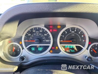Zdjęcie 9 z 12 samochodu: 2007 JEEP WRANGLER SAHARA VIN:1J4GB59177L199231 - miniatura