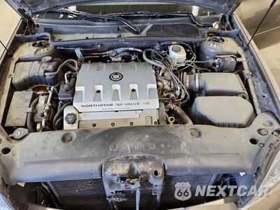Zdjęcie 11 z 12 samochodu: 2003 CADILLAC DEVILLE VIN:1G6KF57983U194303 - miniatura