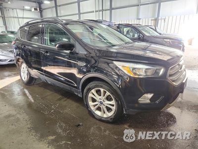 Czwarte zdjęcie samochodu z boku: 2018 FORD ESCAPE SE VIN:1FMCU9GD2JUC58699 - miniatura