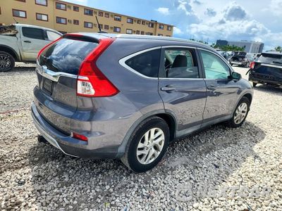 Trzecie zdjęcie samochodu z tyłu: 2016 HONDA CR-V EXL VIN:2HKRM3H76GH564523 - miniatura