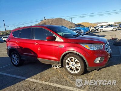 Czwarte zdjęcie samochodu z boku: 2019 FORD ESCAPE SE VIN:1FMCU0G97KUB12100 - miniatura