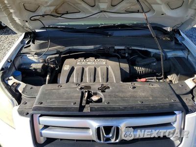 Zdjęcie 12 z 14 samochodu: 2006 HONDA PILOT EX VIN:2HKYF18586H509241 - miniatura