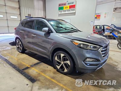 Czwarte zdjęcie samochodu z boku: 2016 HYUNDAI TUCSON LIMITED VIN:KM8J3CA23GU217067 - miniatura
