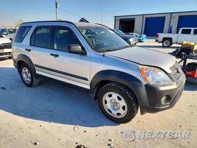 Czwarte zdjęcie samochodu z boku: 2006 HONDA CR-V LX VIN:JHLRD785X6C060446 - miniatura