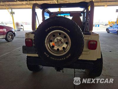Zdjęcie 6 z 13 samochodu: 1999 JEEP WRANGLER / TJ SAHARA VIN:1J4FY49SXXP444643 - miniatura