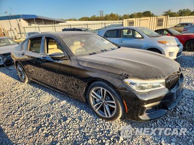 Czwarte zdjęcie samochodu z boku: 2018 BMW 750 XI VIN:WBA7F2C5XJG424405 - miniatura