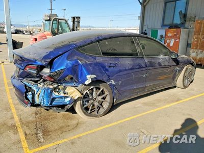 Trzecie zdjęcie samochodu z tyłu: 2023 TESLA MODEL 3 VIN:5YJ3E1EA3PF542534 - miniatura