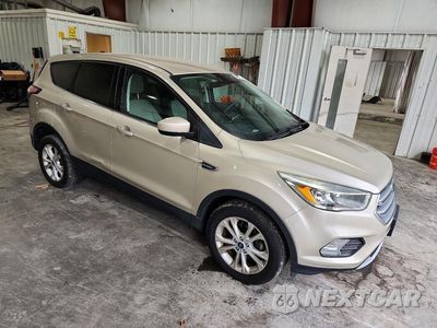 Czwarte zdjęcie samochodu z boku: 2017 FORD ESCAPE SE VIN:1FMCU0GDXHUC17615 - miniatura
