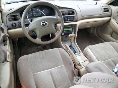 Zdjęcie 8 z 13 samochodu: 2002 MAZDA 626 LX VIN:1YVGF22C025298789 - miniatura