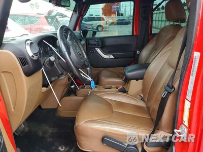Zdjęcie 7 z 13 samochodu: 2016 JEEP WRANGLER UNLIMITED SAHARA VIN:1C4BJWEG5GL288878 - miniatura