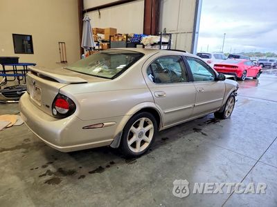 Trzecie zdjęcie samochodu z tyłu: 2000 NISSAN MAXIMA GXE VIN:JN1CA31D4YT521040 - miniatura