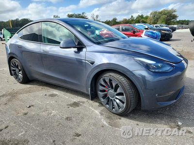 Czwarte zdjęcie samochodu z boku: 2022 TESLA MODEL Y VIN:7SAYGDEF6NF379214 - miniatura