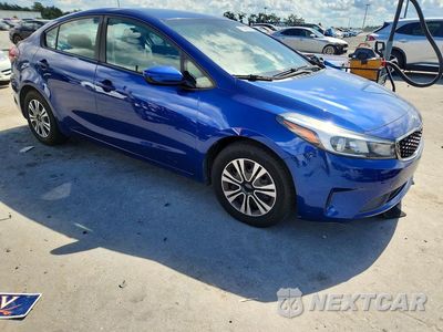 Czwarte zdjęcie samochodu z boku: 2017 KIA FORTE LX VIN:3KPFL4A75HE133621 - miniatura