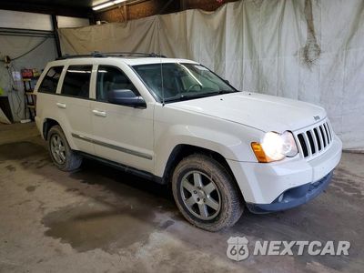 Czwarte zdjęcie samochodu z boku: 2010 JEEP GRAND CHEROKEE LAREDO VIN:1J4PR4GK4AC142848 - miniatura