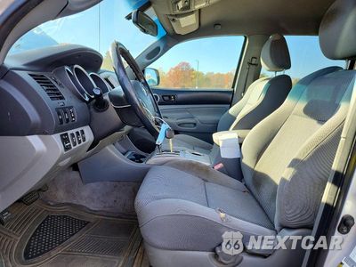Zdjęcie 7 z 12 samochodu: 2011 TOYOTA TACOMA V6 VIN:3TMLU4EN4BM059968 - miniatura