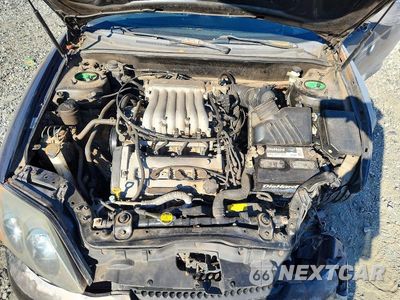 Zdjęcie 11 z 12 samochodu: 2004 HYUNDAI TIBURON GT VIN:KMHHN65FX4U118474 - miniatura