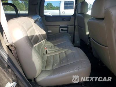 Zdjęcie 11 z 13 samochodu: 2003 HUMMER H2 VIN:5GRGN23U23H109588 - miniatura