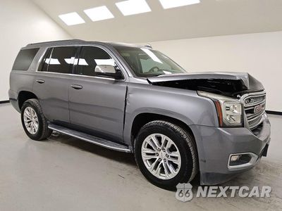 Czwarte zdjęcie samochodu z boku: 2018 GMC YUKON SLE VIN:1GKS1AKC8JR149017 - miniatura