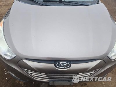 Zdjęcie 12 z 13 samochodu: 2011 HYUNDAI TUCSON GLS VIN:KM8JUCAC0BU257900 - miniatura