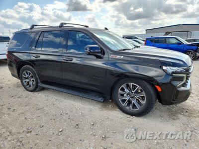 Czwarte zdjęcie samochodu z boku: 2024 CHEVROLET TAHOE K1500 Z71 VIN:1GNSKPKL9RR302468 - miniatura
