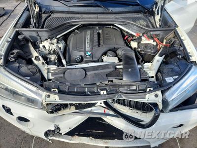 Zdjęcie 12 z 13 samochodu: 2014 BMW X5 XDRIVE35I VIN:5UXKR0C58E0C24793 - miniatura