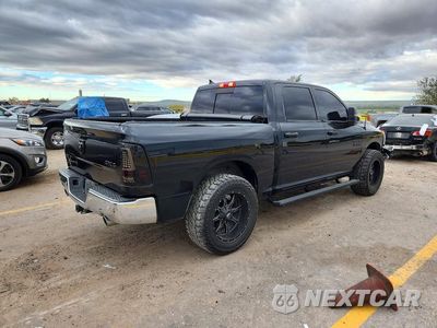 Trzecie zdjęcie samochodu z tyłu: 2018 RAM 1500 SLT VIN:1C6RR7LM6JS297356 - miniatura