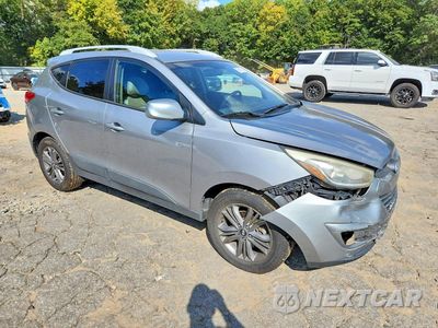 Czwarte zdjęcie samochodu z boku: 2015 HYUNDAI TUCSON SE VIN:KM8JUCAG4FU105093 - miniatura