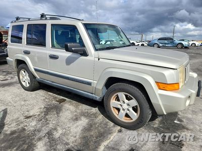 Czwarte zdjęcie samochodu z boku: 2006 JEEP COMMANDER VIN:1J8HH48N26C335067 - miniatura