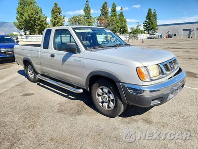 Czwarte zdjęcie samochodu z boku: 1999 NISSAN FRONTIER XE VIN:1N6DD26S4XC324021 - miniatura