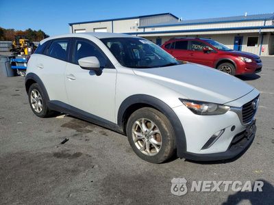 Czwarte zdjęcie samochodu z boku: 2016 MAZDA CX-3 SPORT VIN:JM1DKFB7XG0128040 - miniatura