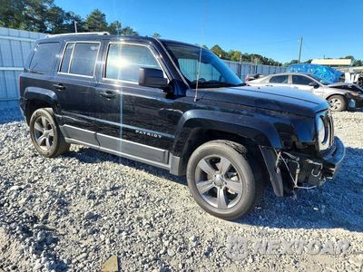 Czwarte zdjęcie samochodu z boku: 2014 JEEP PATRIOT LATITUDE VIN:1C4NJPFA4ED680755 - miniatura