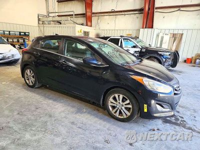 Czwarte zdjęcie samochodu z boku: 2013 HYUNDAI ELANTRA GT BASE VIN:KMHD35LE8DU026255 - miniatura