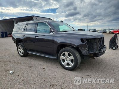 Czwarte zdjęcie samochodu z boku: 2018 CHEVROLET TAHOE C1500 LT VIN:1GNSCBKC8JR363332 - miniatura