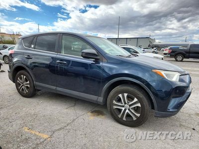 Czwarte zdjęcie samochodu z boku: 2017 TOYOTA RAV4 LE VIN:JTMZFREV8HJ141497 - miniatura