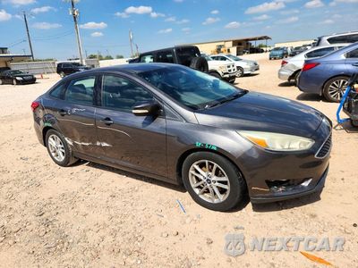Czwarte zdjęcie samochodu z boku: 2015 FORD FOCUS SE VIN:1FADP3F28FL233645 - miniatura