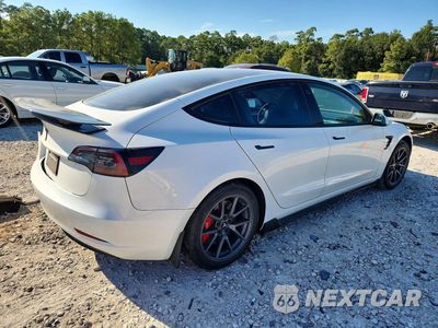 Trzecie zdjęcie samochodu z tyłu: 2023 TESLA MODEL 3 VIN:5YJ3E1EA2PF653561 - miniatura