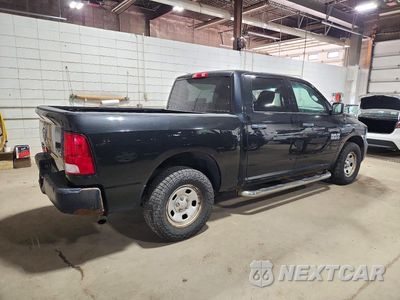 Trzecie zdjęcie samochodu z tyłu: 2016 RAM 1500 ST VIN:1C6RR7KGXGS339810 - miniatura