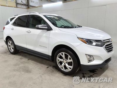 Czwarte zdjęcie samochodu z boku: 2019 CHEVROLET EQUINOX PREMIER VIN:2GNAXNEVXK6186312 - miniatura