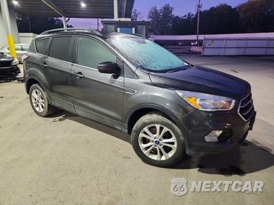 Czwarte zdjęcie samochodu z boku: 2018 FORD ESCAPE SE VIN:1FMCU9GD4JUC77173 - miniatura