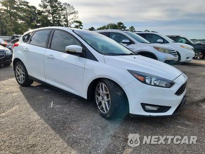 Czwarte zdjęcie samochodu z boku: 2015 FORD FOCUS SE VIN:1FADP3K29FL345814 - miniatura