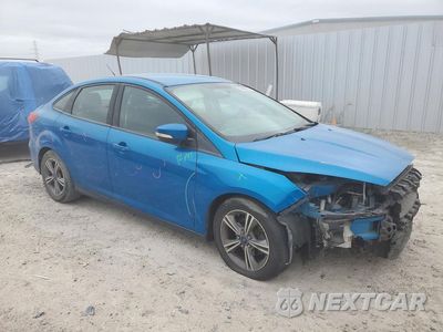 Czwarte zdjęcie samochodu z boku: 2017 FORD FOCUS SE VIN:1FADP3FE5HL214127 - miniatura