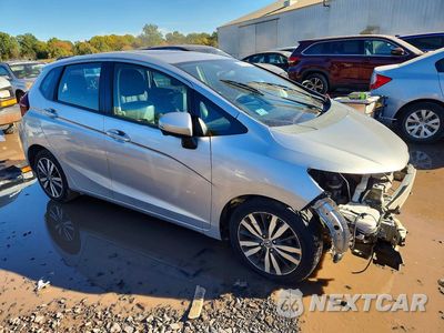 Czwarte zdjęcie samochodu z boku: 2016 HONDA FIT EX VIN:3HGGK5H98GM703394 - miniatura