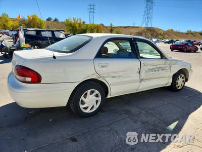 Trzecie zdjęcie samochodu z tyłu: 1998 MAZDA 626 DX VIN:1YVGF22C4W5735957 - miniatura