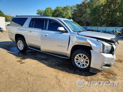 Czwarte zdjęcie samochodu z boku: 2018 GMC YUKON XL C1500 SLT VIN:1GKS1GKC0JR378391 - miniatura